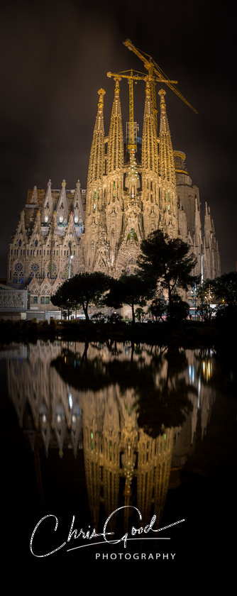 Reflections on Gaudi 
 A shot almost 100 years in the making. Gaudi's masterpiece the Sagrada Familia in Barcelona and its reflecting pool. 
 Keywords: Barcelona, Barca. Gaudi, Antoni Gaudi, Modernisme, Catalunya. Catalonia, Spain, Architecture, Modernist, Reflection, Chris Good